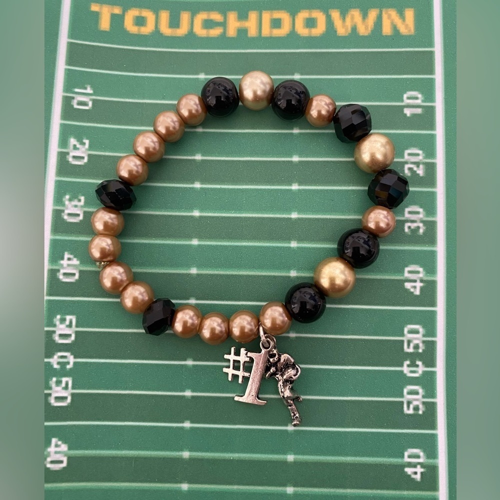 Handmade beaded stretch bracelet with charm